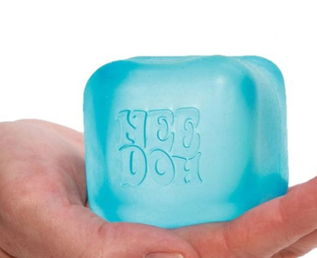 Blue needoh with 'nee Doh' branding held in a hand against a white background